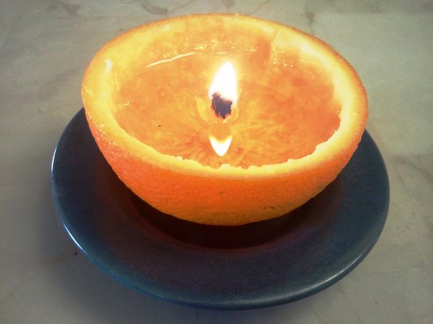 Candle made in an orange peel