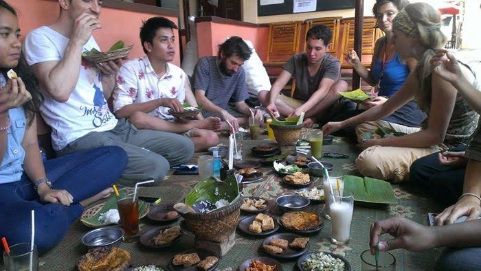 Indonesian people eating using right hand