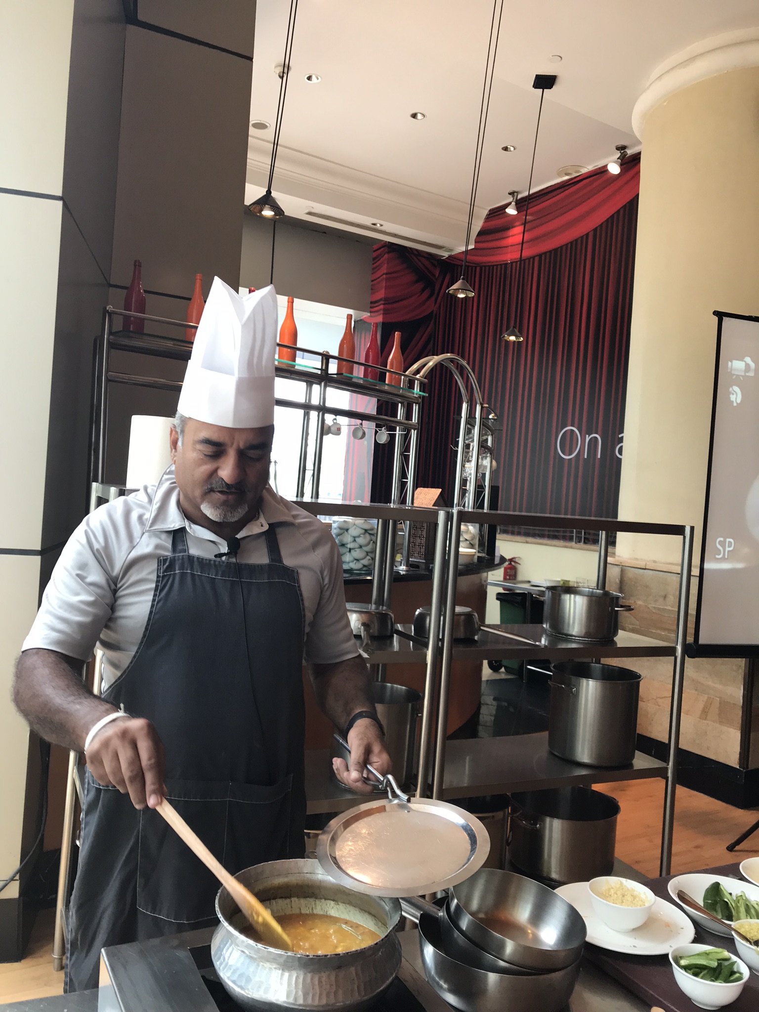 Pradeep Sainani demonstrating his dishes