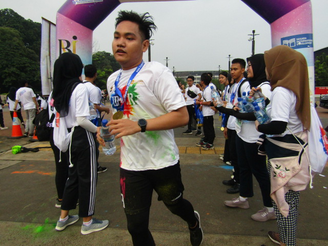 Indoindians Holi Color Run participant who has finished the marathon.