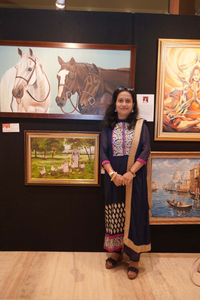 Arupa with her Artworks at Exhibition