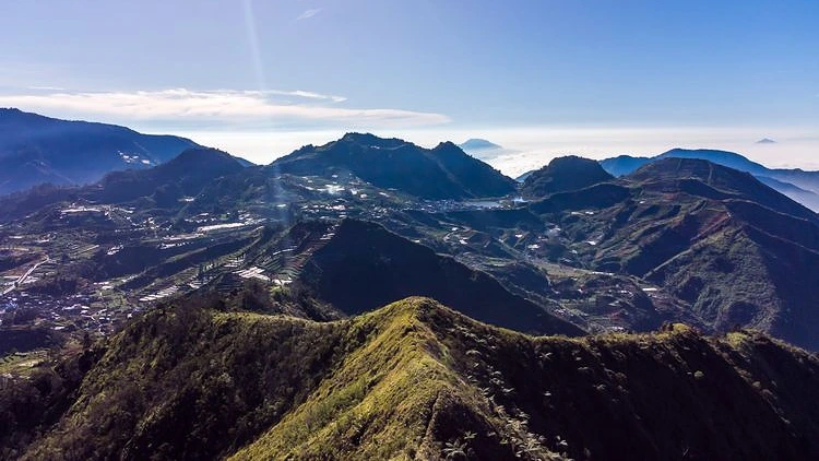 mount-bromo-rows-of-mountains-and-plantations