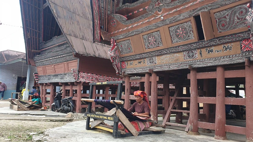 Activities at Lake Toba Shopping and Learning Ulos in Ulos Village