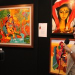 Shanthi Sheshadri with her artwork at exhibition