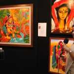 Shanthi Sheshadri with her artworks at exhibition. Shanthi Sheshadri with her artwork at exhibition